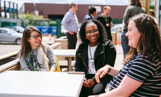 Three Female Colleagues Talking