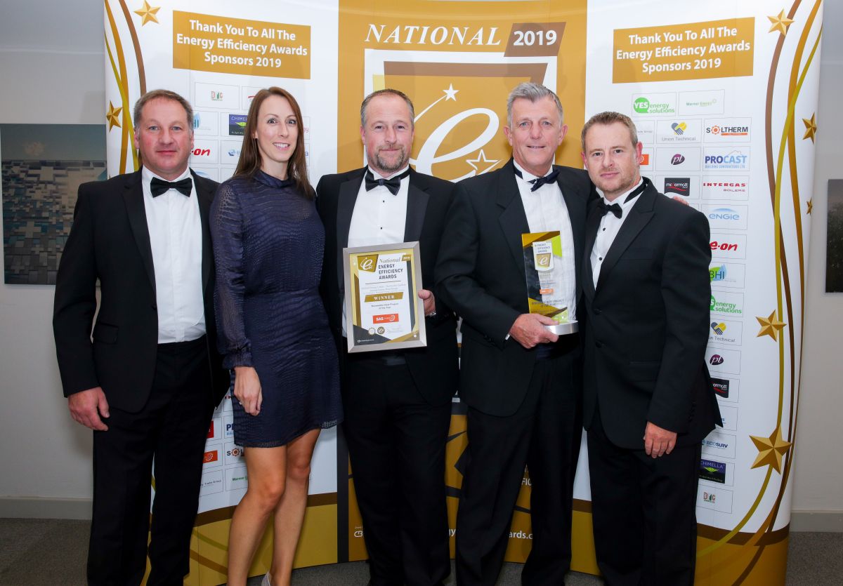J Tomlinson & Bromford staff celebrate their award at the National Energy Efficiency Awards 2019