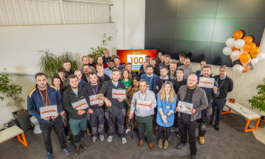 Bromford colleagues holding award certificates 