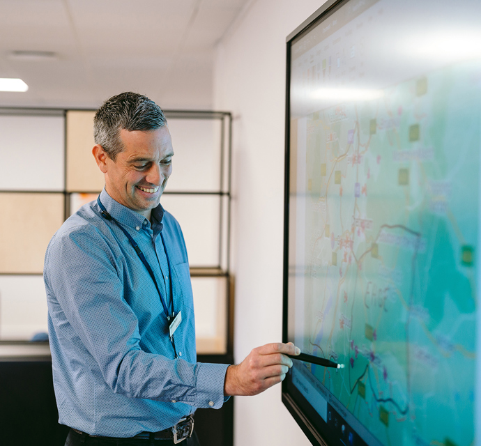 a bromford colleague working in an office