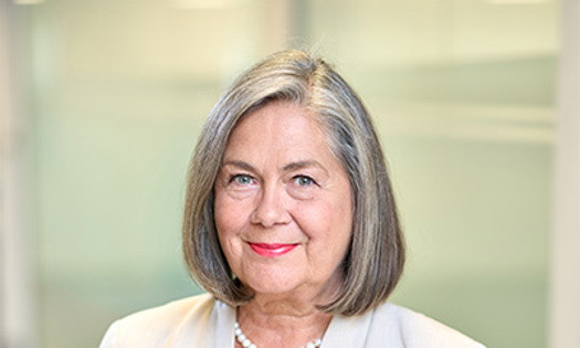 Head and shoulders photograph of a Bromford colleague in an office