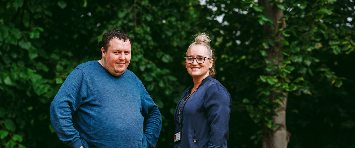 a bromford customer talking to their neighbourhood coach in their garden