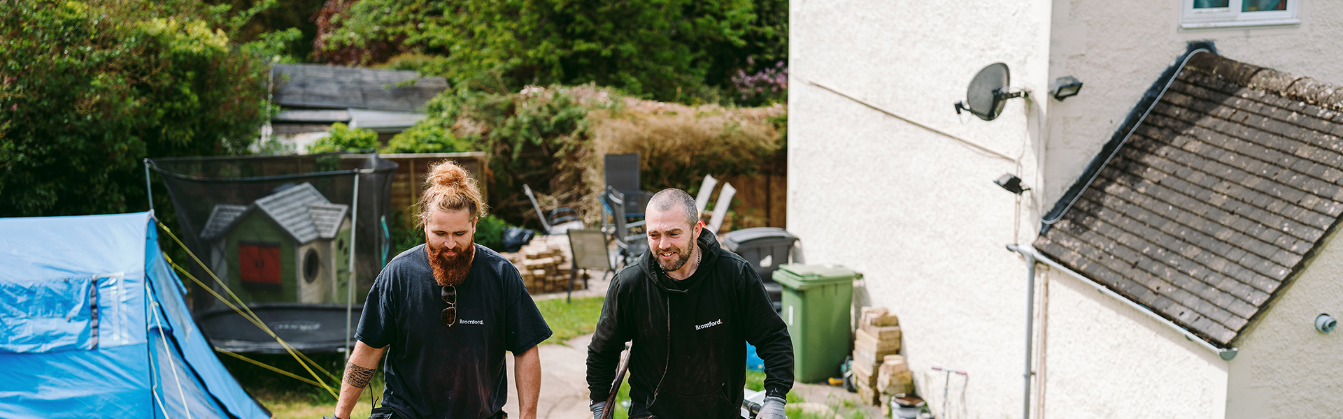 Two bromford colleagues working outside