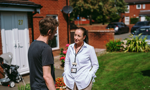 a Bromford colleague talking to a customer