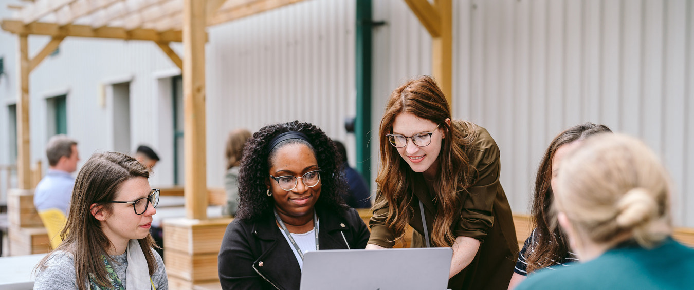 Female Colleagues Around A Table