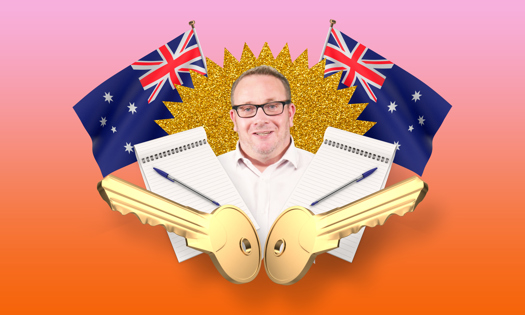 Allan Maund in front of Australian flags 