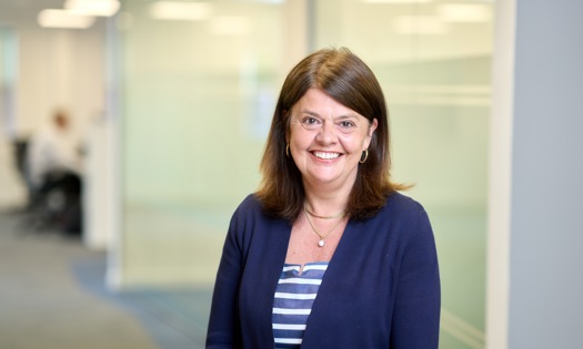 Head and shoulders photograph of a Bromford colleague in an office