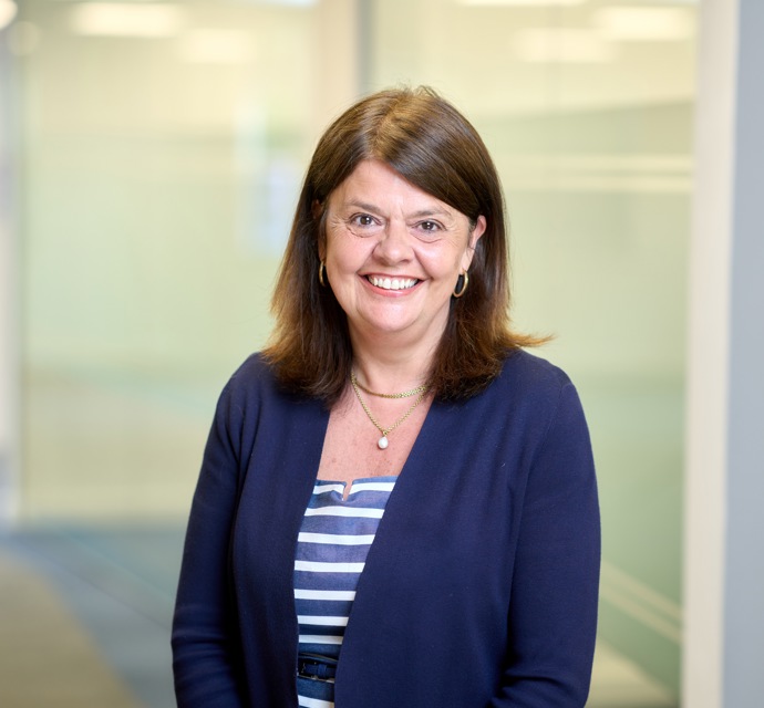 Head and shoulders photograph of a Bromford colleague in an office