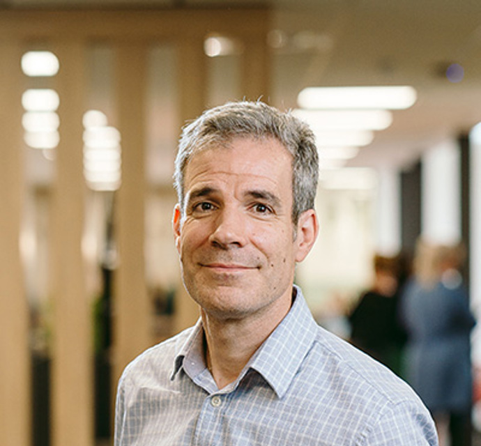 Head and shoulders photograph of a Bromford board member in an office